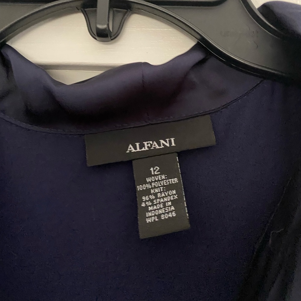 Alfani Woman’s blouse New with tags.